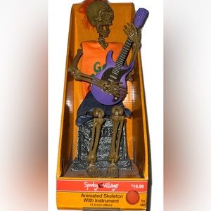 Spooky Village Animated Skeleton With Instrument.  (LOC TUB-113)